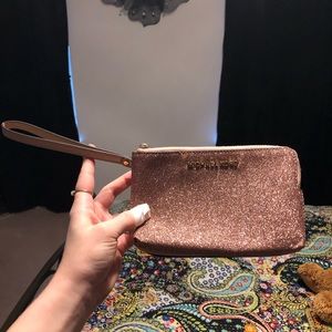 Rose gold Michael Kors clutch wristlet